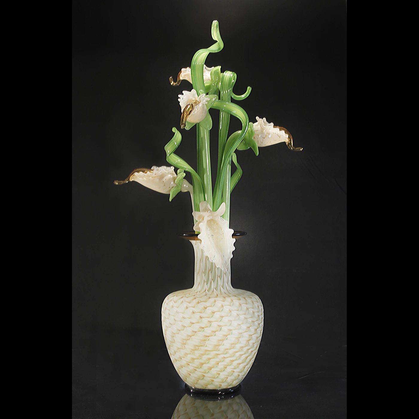 Blown-glass vase with white flowers and curling green stems by LaChaussee Blown Glass